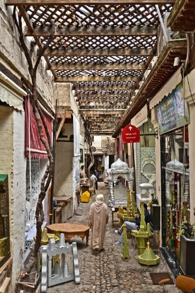 Wood carving in Fez is a highly respected and intricate craft that has been practiced for centuries. This ancient art is used to create stunning decorative details on doors, windows, ceilings, and even traditional Moroccan furniture. The delicate patterns often reflect Islamic geometric designs and floral motifs, showcasing the artisans' exceptional craftsmanship. The process of wood carving involves handcrafting each design with precision, using chisels and knives to create intricate details. The result is a beautifully detailed piece of art that adds both elegance and warmth to the spaces it adorns. 🌟 Why This Craft Matters: Cultural Heritage: Moroccan wood carving is a symbol of craftsmanship, reflecting the city's rich architectural history. Timeless Appeal: The detailed carvings transform simple furniture and architectural elements into works of art that stand the test of time. Personal Touch: Every piece of carved wood is unique, created by artisans who pass down their skills t