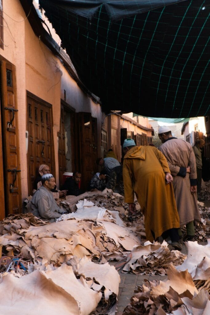 Fez Shopping Guide: What to Buy in Morocco’s Craft Capital 19 In the heart of Fez, especially around the medina’s tanneries and leather souks, you’ll find skilled leather artisans who specialize in crafting beautiful handmade bags, backpacks, wallets, and other accessories. These craftsmen take pride in transforming naturally tanned leather—often processed in the famous tanneries of Fez—into high-quality, durable, and stylish items. Using traditional techniques and tools, each piece is cut, stitched, and assembled by hand, making every product unique. Designs range from classic and vintage to modern, often incorporating berber patterns, embossed symbols, or colorful dyes. 🌟 Why You’ll Love This Craft: Authenticity: These bags are not mass-produced — they’re the result of genuine artisanal work. Cultural Connection: Buying directly from the artisan supports local heritage and allows you to own a piece of living Moroccan tradition. Quality and Style: Fez leather is known for its softness, strength, and beautiful natural texture.