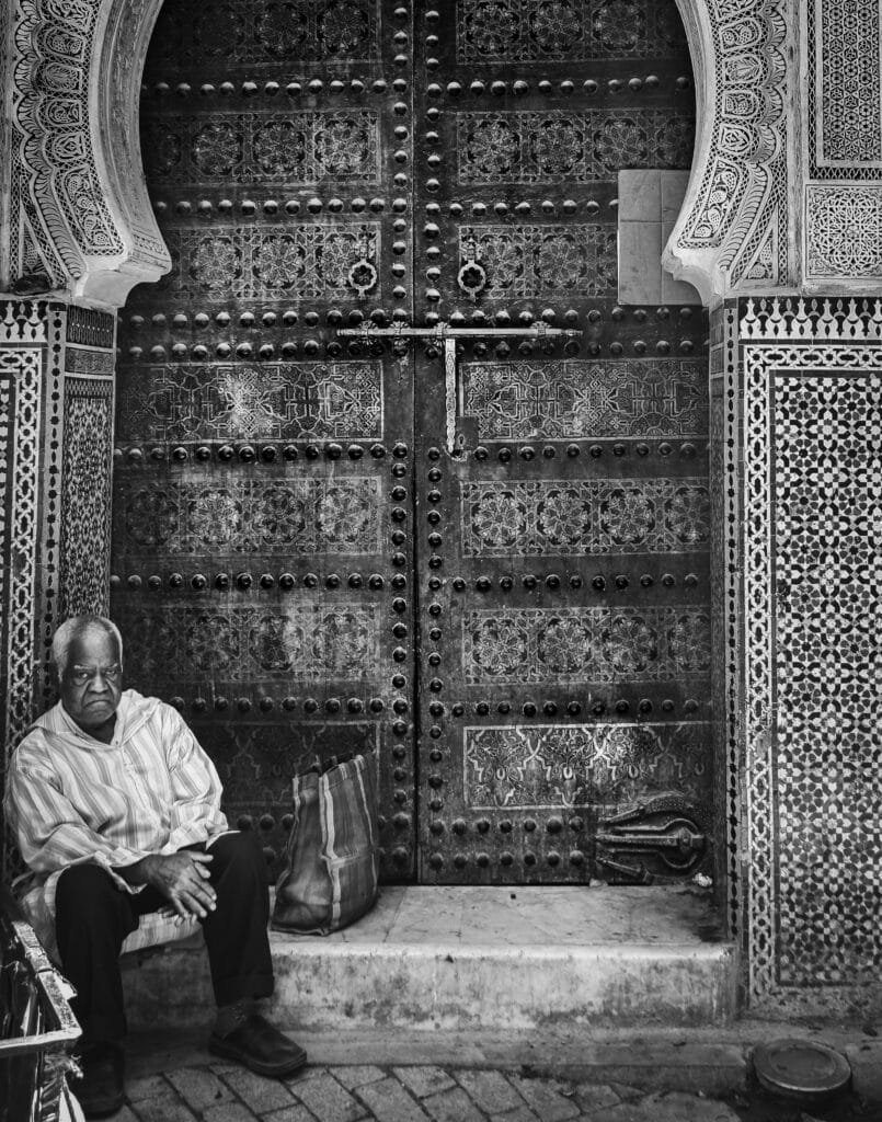Top Things That Make Fez Special: History & Handicrafts 14 Tucked away in the winding alleys of Fez’s medina, the Zawiya of Sidi Ahmed Tijani is a peaceful spiritual retreat.
Sidi Ahmed Tijani was a great Sufi master and the founder of the Tijaniyya order, which spread across Africa and beyond.
The zawiya (spiritual lodge) is not just a religious site, but a living piece of Morocco’s rich Sufi heritage.
Although access inside is reserved for Muslims, visitors can still admire the beautiful exterior and feel the quiet, sacred energy that surrounds it.
For travelers interested in culture, spirituality, and hidden gems, this spot is a must-see to better understand the deep layers of Fez’s spiritual life.