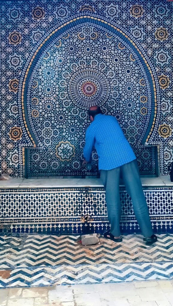 Top Things That Make Fez Special: History & Handicrafts 71
Zellige is a centuries-old craft that embodies the heart and soul of Moroccan artistry. Skilled artisans in Fez meticulously create intricate, hand-cut ceramic tiles, which are then arranged into beautiful geometric patterns that decorate everything from mosques and madrasas to palaces and fountains.The process begins with crafting each individual tile by hand, often from clay sourced locally, and then applying vibrant, natural glazes. The artisans carefully cut and arrange the tiles, piecing them together like a puzzle to create captivating mosaics. The precision and patience involved in the process make each piece a true masterpiece of craftsmanship.🏺 Why It’s Special:
Timeless Beauty: The unique patterns and vibrant colors are instantly recognizable as symbols of Moroccan heritage.Exquisite Craftsmanship: Zellige artisans devote years of practice to perfecting their skills, ensuring each piece is of the highest quality.Cultural Significance: This craft is not just about decoration; it's a spiritual expression often used in sacred spaces, symbolizing harmony and unity.