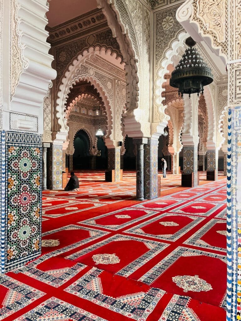 Hidden Things to Do in Fez: A Local's Guide to Secret Spots (2025) 15 Nestled in the heart of the ancient medina of Fez, the Andalusian Mosque is one of the oldest and most beautiful mosques in Morocco. Built in the 9th century (around 859 AD) by Mariam al-Fihri, sister of Fatima al-Fihri who founded the famous Al-Qarawiyyin University, it shares both a cultural and spiritual legacy with this iconic institution. 🌍 Why Should You Visit? It embodies a unique Andalusian-Moroccan heritage, symbolizing the migration of Muslims from Andalusia to Fez, bringing their knowledge and culture with them. The mosque is a masterpiece of Andalusian architecture, featuring ornate arches, intricate stucco work, and a beautifully carved wooden minbar. Although non-Muslims can't enter the interior, the exterior façade, courtyard, and surrounding ambiance offer a deeply spiritual and historical experience. 📍 Location: The mosque is located in the Andalusian Quarter, directly across from Al-Qarawiyyin Mosque, easily integrated into any tour of the old city. Visiting the Andalusian Mosque offers a chance to reflect on the beauty of Andalusian Islamic history, completing a unique journey through Fez, the city of scholars and artisans.