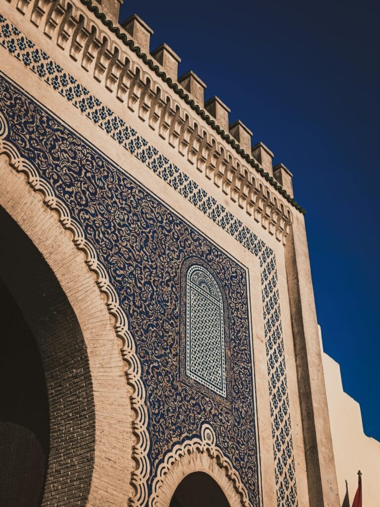 Top Things That Make Fez Special: History & Handicrafts 23 No trip to Fes is complete without passing through the famous Bab Boujloud, also known as the Blue Gate. This magnificent entrance to the old medina is one of the city’s most iconic landmarks, easily recognized by its stunning blue mosaics on the outside and vibrant green tiles on the inside — symbolizing the colors of the city and Islam.