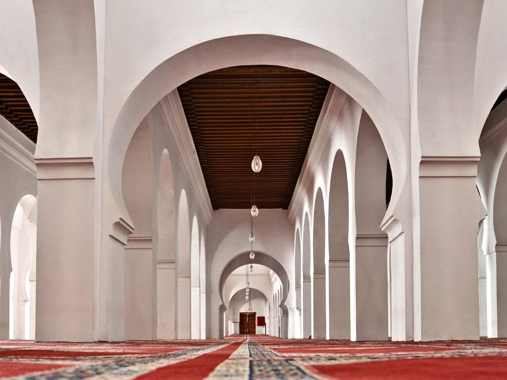 Secrets of the city of Fez that you will not find anywhere else 3 Nestled along the banks of the Fez River, the Andalusian Mosque is one of the oldest and most beautiful mosques in Morocco. Built in 859 AD by Mariam al-Fihri, the sister of Fatima al-Fihri (founder of Al-Qarawiyyin University), it shares a spiritual and cultural connection with the famous mosque. 🌍 Why Visit? The mosque represents a unique Andalusian-Moroccan heritage, symbolizing the migration of Muslims from Andalusia to Fez, bringing their knowledge and culture with them. The architecture is stunning, with decorative arches, intricate stucco work, and beautifully carved wooden pulpits. While the mosque itself is not open to non-Muslims, the exterior, courtyard, and surrounding atmosphere provide a peaceful and historically rich experience. 📍 Location: It is located in the Andalusian Quarter, across the Fez River from Al-Qarawiyyin Mosque. You can easily incorporate it into a walking tour of the old medina. A visit to the Andalusian Mosque offers a chance to reflect on the beauty of Andalusian Islamic history, completing a memorable journey in Fez, the city of scholars and artisans.