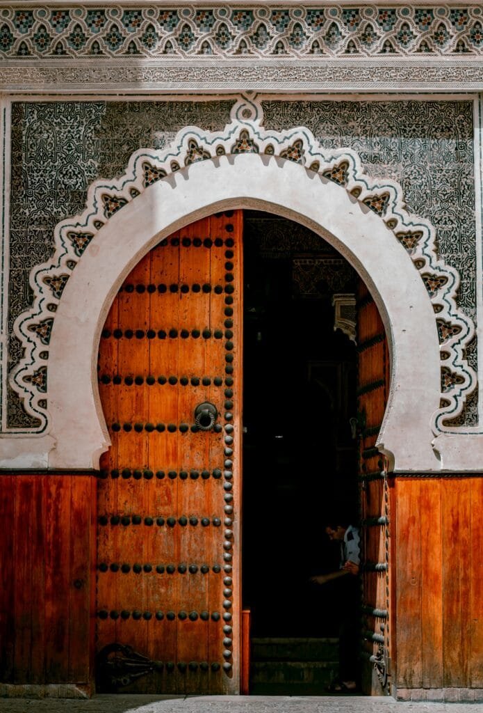 Top Things That Make Fez Special: History & Handicrafts 40 Located in the heart of Fez’s ancient medina, Nejjarine Square is one of the city's most charming and historic plazas. Named after the “Nejjarine” (woodworkers) who have practiced their craft here for centuries, the square remains alive with the spirit of traditional Moroccan artisanship. 🏛️ Highlights of the Square: Nejjarine Museum of Wooden Arts & Crafts: Housed in a beautifully restored 18th-century caravanserai (funduq), the museum showcases an impressive collection of wooden tools, carved doors, furniture, and artistic pieces that celebrate Morocco’s woodworking heritage. Nejjarine Fountain: One of the most stunning public fountains in Fez, adorned with colorful zellige tiles and carved wood — once a vital stop for travelers and traders to refresh. 🌍 Why Visit? Surrounded by traditional shops selling handcrafted furniture, wooden decor, and artisanal treasures. A perfect blend of living craftsmanship and historic beauty. Centrally located, it’s a must-see stop on any medina tour, close to major landmarks like the Al-Qarawiyyin Mosque and Attarine Souk. Visiting Nejjarine Square is a journey into the timeless artistry and cultural soul of Fez, where history and handmade beauty come to life.