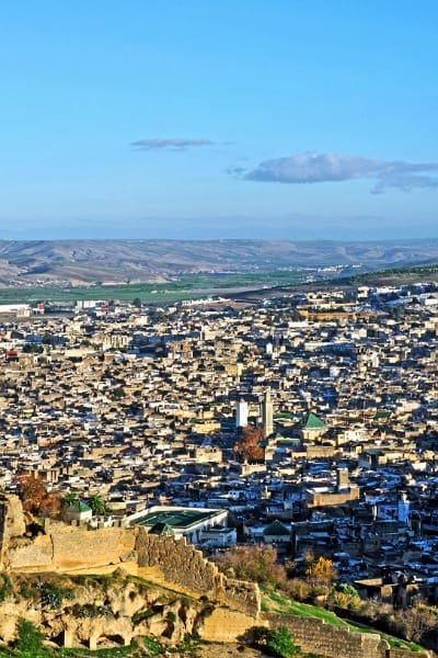 Fez is a city that speaks the language of history, where every street corner, every stone, and every whisper in the air seems to carry the essence of centuries past. Known as one of Morocco's oldest cities, Fez is a vibrant tapestry of culture, architecture, and tradition. Its medieval medina, a UNESCO World Heritage site, is a labyrinth of narrow alleys and winding streets that tell stories from the Islamic golden age. As you explore, you will find yourself walking through time, surrounded by beautiful palaces, intricate mosques, artisan workshops, and bustling souks. Fez is a place where the past and present meet, creating an unforgettable experience.
