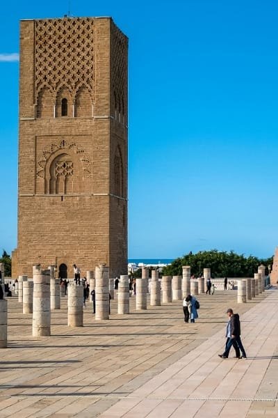 The modern capital of Morocco, Rabat, seamlessly blends its ancient heritage with a contemporary elegance. Explore the historic Kasbah of the Udayas, perched dramatically over the Atlantic, with its charming blue and white houses and Andalusian Gardens. Visit the iconic Hassan Tower, a colossal minaret from an unfinished mosque, standing proudly beside the Mausoleum of Mohammed V, a stunning example of modern Moroccan architecture and a tribute to the royal family.