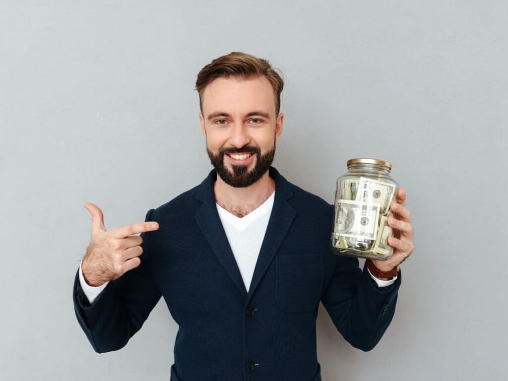 The ornate interior of LA CASA DAR RAYAN guesthouse, showcasing traditional Moroccan gold and black design. Available for affordable full rental (3 bedrooms) for groups and families seeking luxury on a budget in Fes.