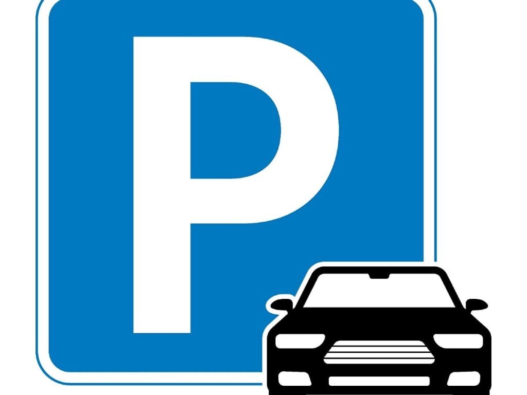 A blue parking sign with a white 'P' and a black car icon, symbolizing convenient nearby parking availability for guests staying at LA CASA DAR RAYAN guesthouse in Fes Medina.